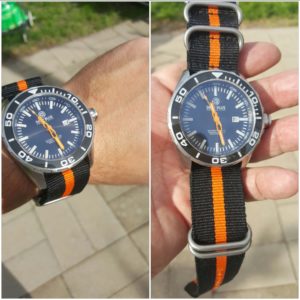 Deep blue t-100 on black/orange nato