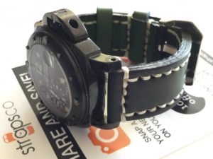 Green-black white stitch on black watch